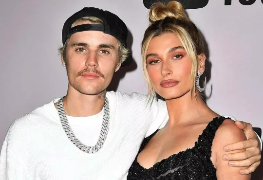 Justin Bieber kissing Hailey Bieber on the cheek during an outdoor date, quashing divorce rumors