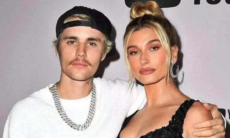 Justin Bieber kissing Hailey Bieber on the cheek during an outdoor date, quashing divorce rumors
