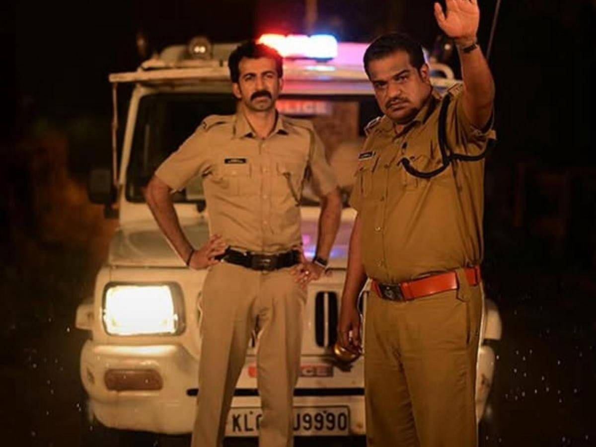 Roshan Mathew and Dileesh Pothan in Ronth Malayalam movie still from the intense cop thriller