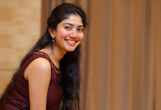 Sai Pallavi smiling with glowing skin, showcasing her natural beauty without makeup
