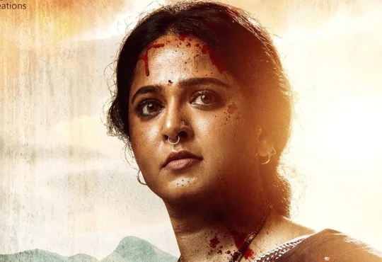 Anushka Shetty announcing her social media break, sitting thoughtfully with a handwritten note