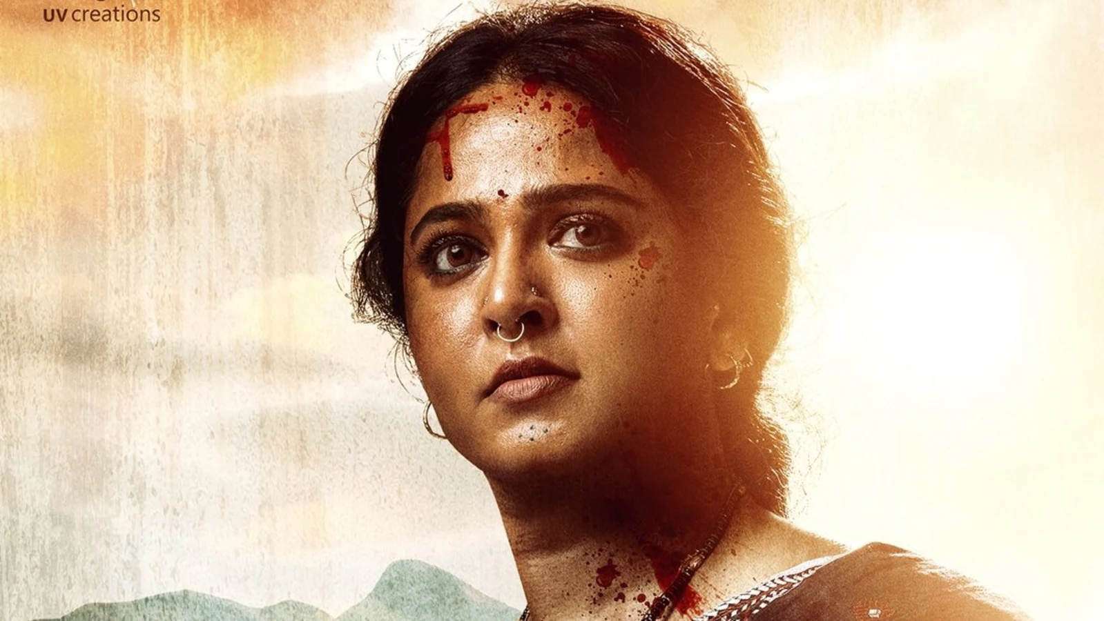 Anushka Shetty announcing her social media break, sitting thoughtfully with a handwritten note