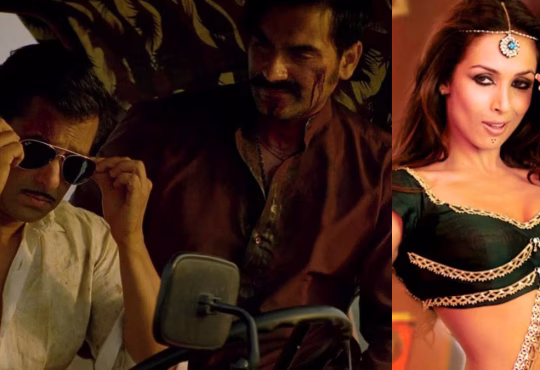 Malaika Arora performing in Munni Badnaam Hui with Salman and Arbaaz Khan in the background