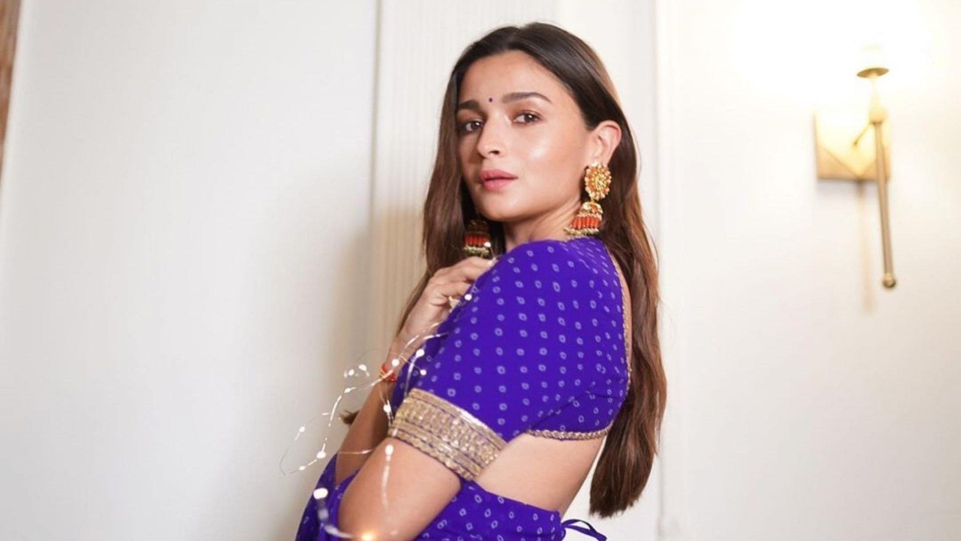 Alia Bhatt's trendsetting blouse designs are a perfect blend of elegance and modernity