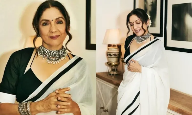 Neena Gupta in a bold outfit smiling confidently at a public event with Masaba Gupta