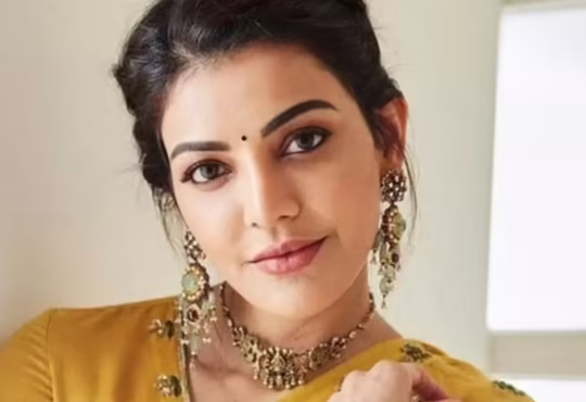 Kajal Aggarwal smiling at a public event amid car accident death rumor