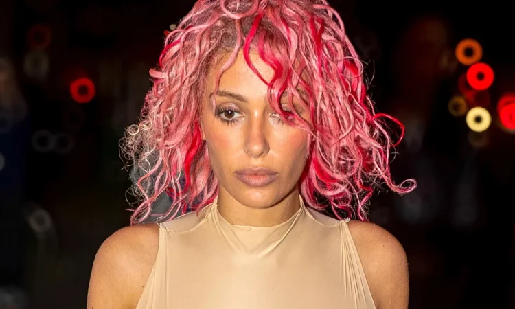 Bianca Censori posing in a minimalist fashion look representing her celebrity style