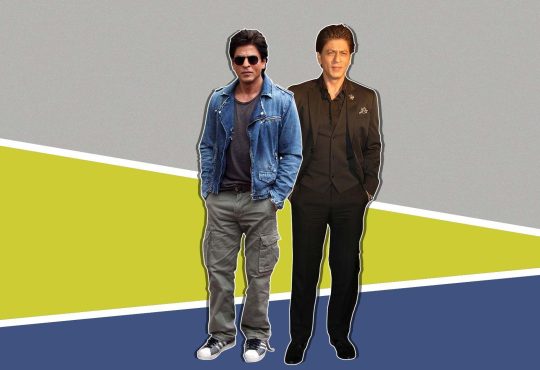Shah Rukh Khan in a stylish black suit showcasing his timeless fashion evolution