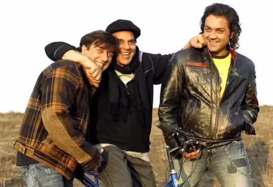 Dharmendra with Sunny and Bobby Deol smiling during Gadar 2 event