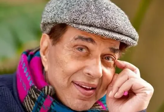 Dharmendra posing on a film set, legendary Bollywood actor who passed away at 89
