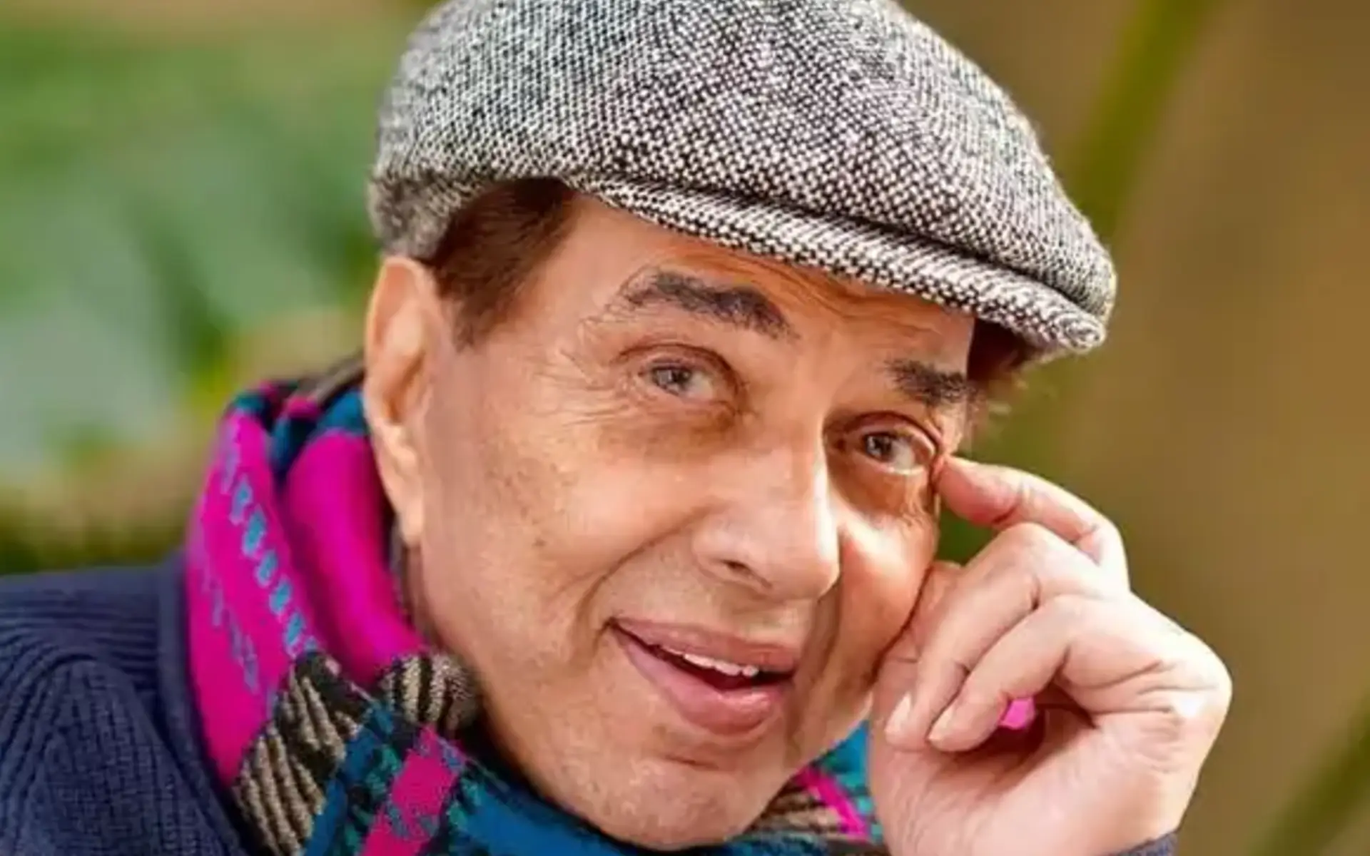 Dharmendra posing on a film set, legendary Bollywood actor who passed away at 89