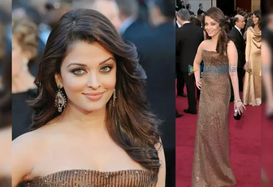 Aishwarya Rai touching PM Modi’s feet at Sai Baba centenary event