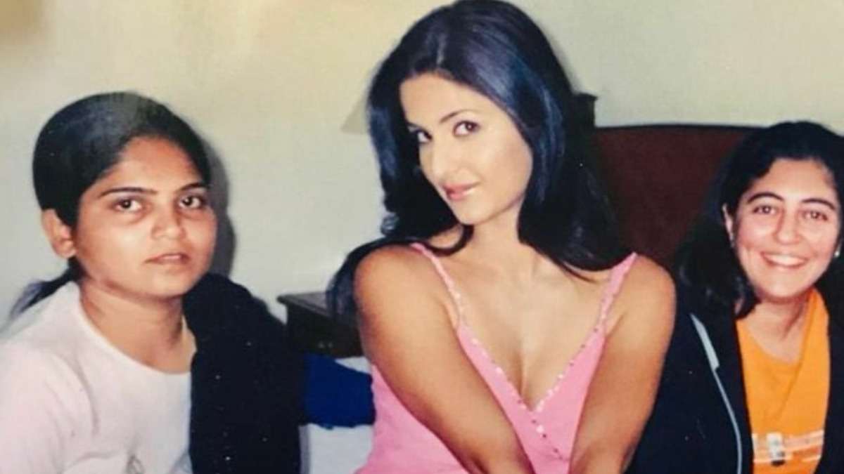 Katrina Kaif smiling during a behind-the-scenes moment on a movie set