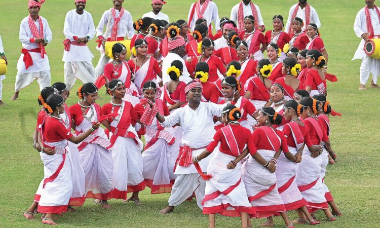 Assamese girls performing traditional Bihu dance celebrating Assamese culture